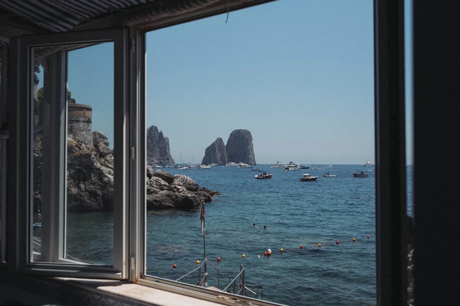 window over blue ocean